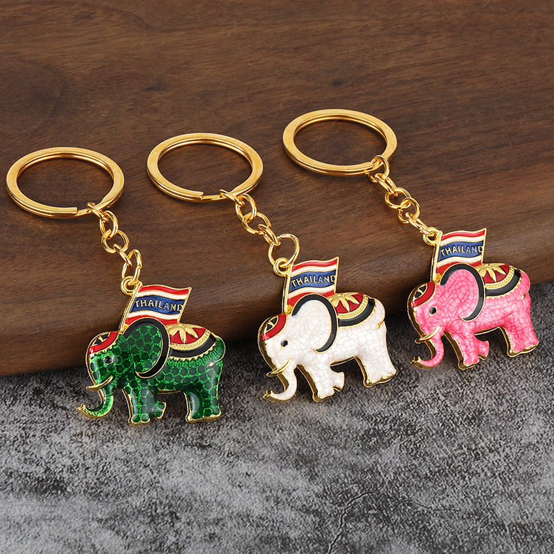 Elephant Holding a Flag Celebrates the Cross-Border Success of Thai Baby Elephant Keychains, a Popular Keychain Pendant, Creative Hanging Ornament Gift Elephant Holding a Flag Celebrates the Cross-Border Success of Thai Baby Elephant Keychains, a Popular Keychain Pendant, Creative Hanging Ornament Gift