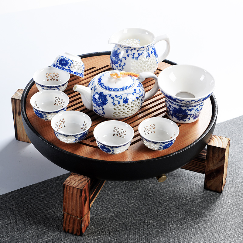 Japanese porcelain god contracted household kung fu tea set ceramic cups of black solid wood storage type tea table ground suit