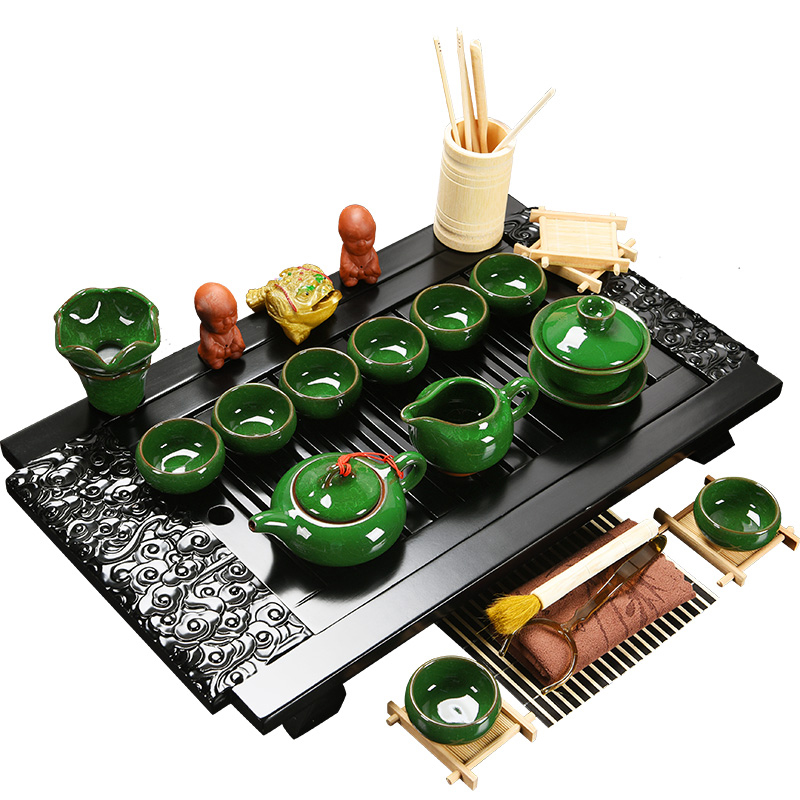 Porcelain god solid wood tea tray of a complete set of kung fu tea set drainage water the draw - out type tea table with beverage holder tray was home