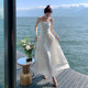 French white sling backless a-line dress female summer high-end sweet Sanya seaside holiday fairy skirt