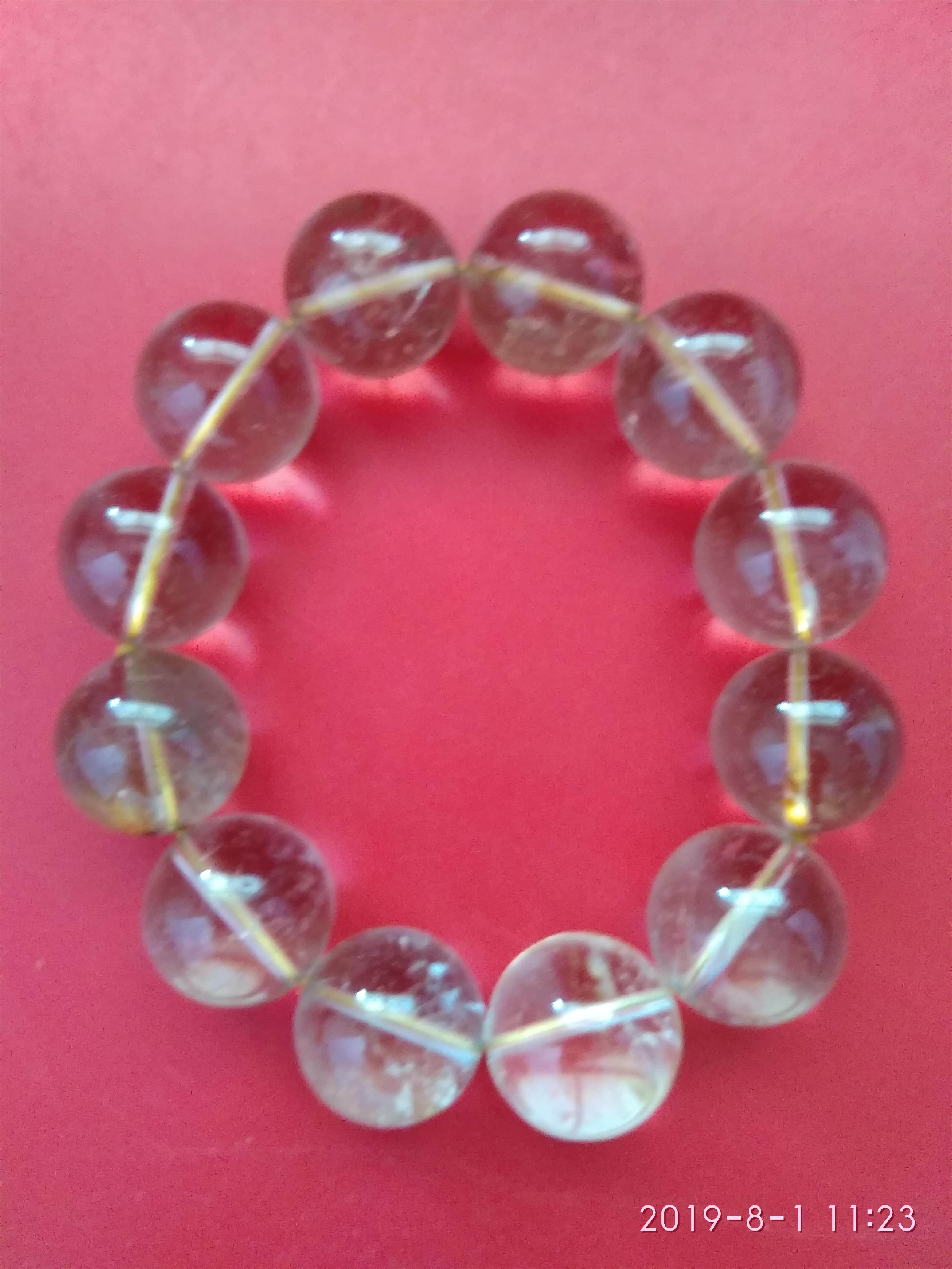 Crystal handstring (12) in a series of pieces.