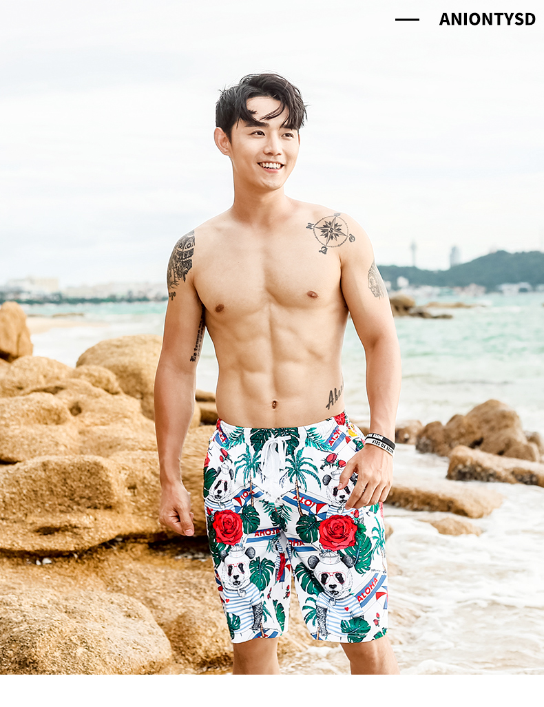 Youyou quần đi biển quần lửng khô nhanh bên bờ biển kỳ nghỉ cặp vợ chồng quần đi biển quần bơi nam quần boxer năm điểm - Quần bãi biển quần đôi đi biển