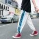 Một chiếc quần nam mùa thu lỏng lẻo quần hip hop nam phiên bản Hàn Quốc của xu hướng quần lửng ống rộng áo nam
