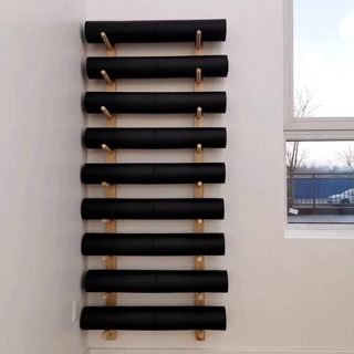 Simple, space-saving, large-capacity iron shelf