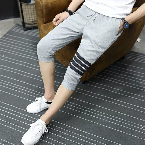 Quần tây nam trẻ trung phiên bản Hàn Quốc của xu hướng quần nam 7 điểm mỏng Phần chân mỏng thể thao quần short nam giản dị