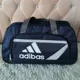 Phiên bản Hàn Quốc của túi hành lý vải Oxford dung tích lớn túi duffel nhẹ đi khoảng cách ngắn Túi du lịch nữ xách tay đơn giản chống thấm nước - Túi du lịch