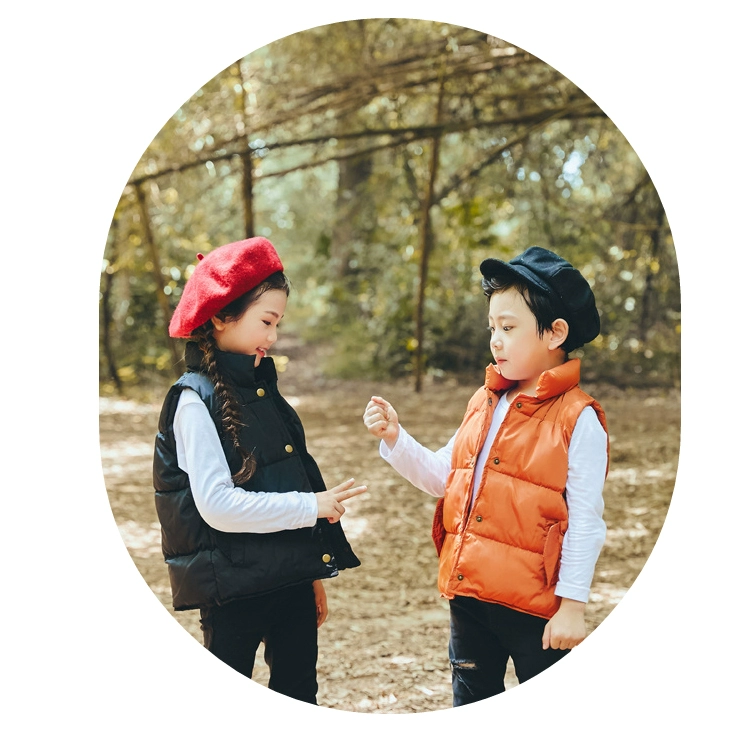Quần áo trẻ em trẻ em xuống áo vest bé trai và bé gái mùa thu đông
