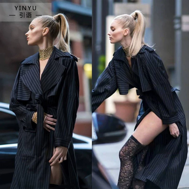 Black trench coat, fitted brace, jacket, mid-length, city style, British style