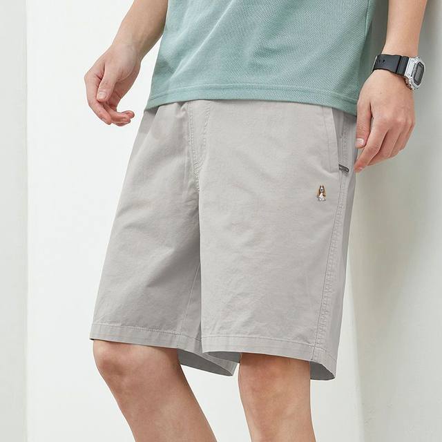 Outlet summer ຜູ້ຊາຍ 100% cotton 100% ສັ້ນ casual shorts fashionable ສີແຂງ zipper ແບບກະເປົ໋າຫ້າຈຸດ trendy