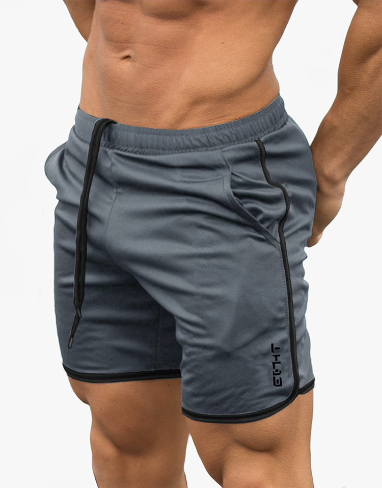 New fitness muscle brothers thể thao quần short chạy nhanh khô quần mùa hè phần mỏng đào tạo ba quần lỏng lẻo quần tập gym