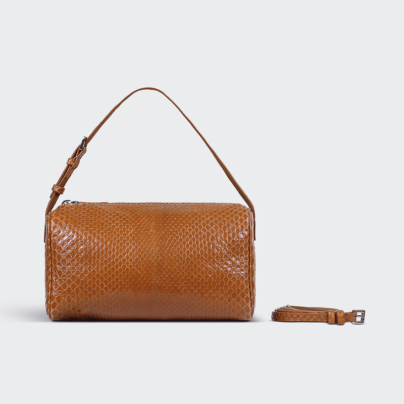 Jumping Pen Case Made of Python Skin. the Requirements Are Not Too High. It Has Raised Scales. Very Cheap. Makes It Difficult to Fit a Large Phone