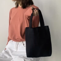 Портативная черная небольшая сумка