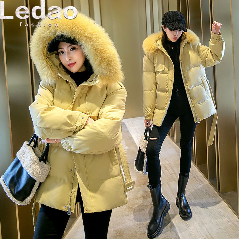 Anti-seasonal special sale down jacket women's big fur collar new winter Korean version of the mid-length model waist white duck down jacket tide
