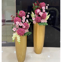 Hotel lobby floor-to-ceiling large gold revolving door window decoration floral ornaments shopping mall simulation flower arrangement