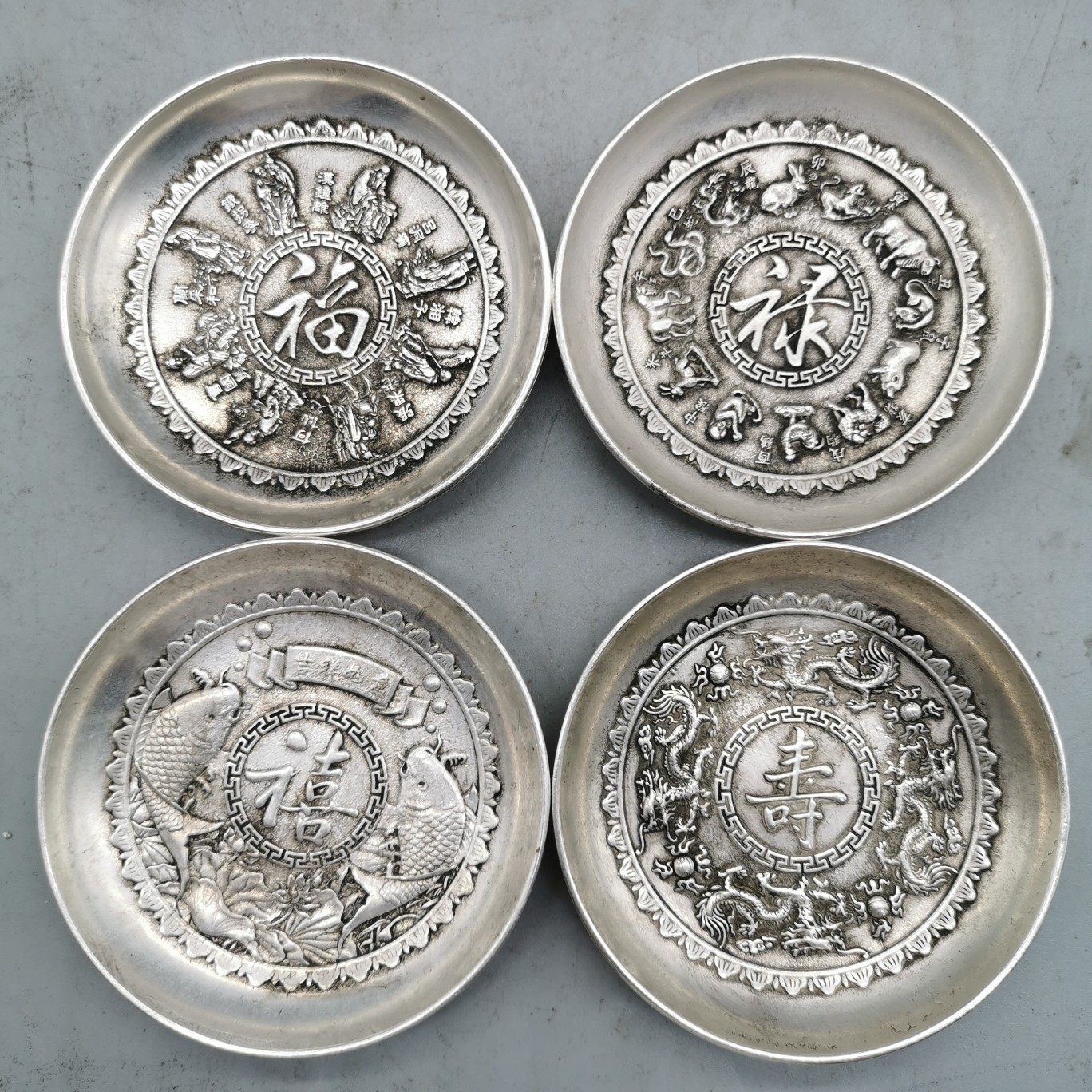 Make the old Miao silver white bronze disc Embossed Eight Immortals XII Life Jubilee Four set prices