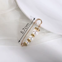 Золотой корсет, брошь