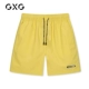 GXG nam mùa hè nam đơn giản giản dị in chữ màu vàng quần short thể thao quần short năm điểm quần nam - Quần Jogger