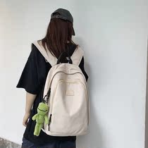 2021 new female college students solid color backpack large capacity male high school students canvas bag primary and secondary school students shoulder backpack