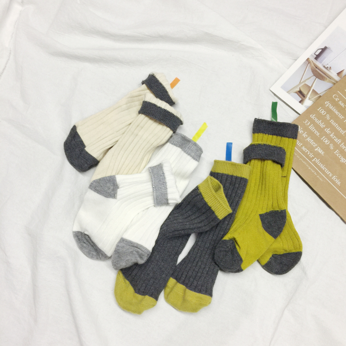 Quần áo trẻ em Ivan mùa thu và mùa đông trẻ em vớ cotton đan vớ bé trai và bé gái quần tất trơn trẻ em