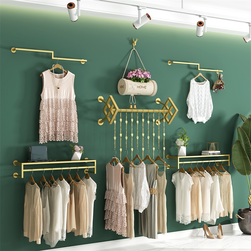 Boys and girls clothing store display shelves on the wall hanging shop display shelves gold hanging clothes shelf wall