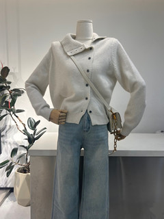 Elegant white asymmetrical diagonal placket long-sleeved knitted sweater for women in autumn and winter new loose and versatile cardigan jacket