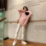 Mùa thu mới Hàn Quốc kẻ sọc hồng nhẹ nhàng kẻ sọc cổ chữ V thời trang hoang dã áo len lỏng nữ áo kiểu trung niên u50