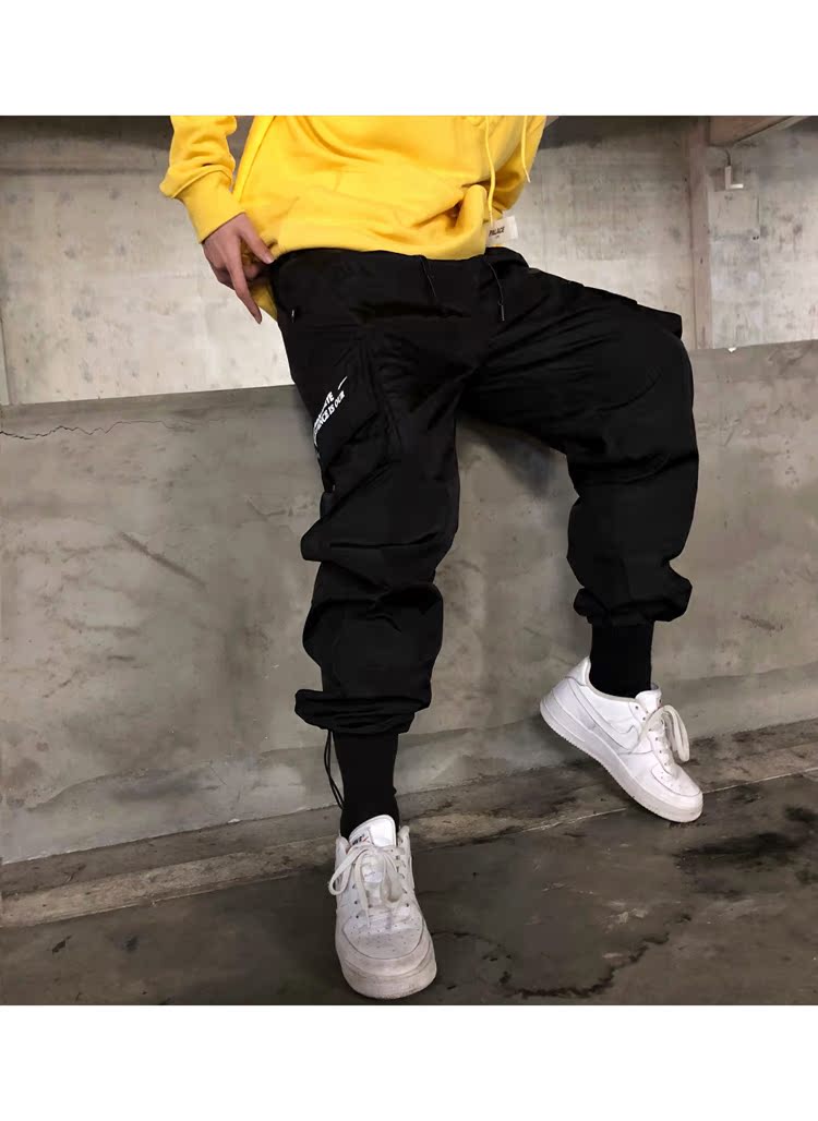Hip hop hiphop quần lỏng lẻo nhiều túi dụng cụ quần rộng chân thủy triều thương hiệu nam và nữ lỏng lẻo mồ hôi chức năng shop quần áo nam