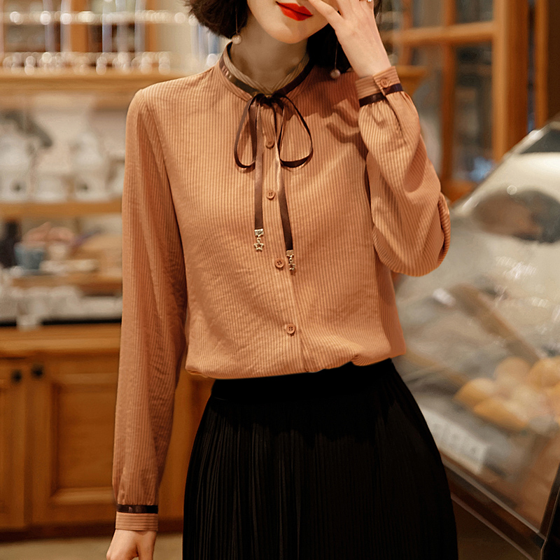 2022 spring autumn new caramel color foreign pie small upright collar shirt woman long sleeve design feeling small heuristic blouses