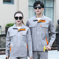 Светло -серый с апельсиновым костюмом