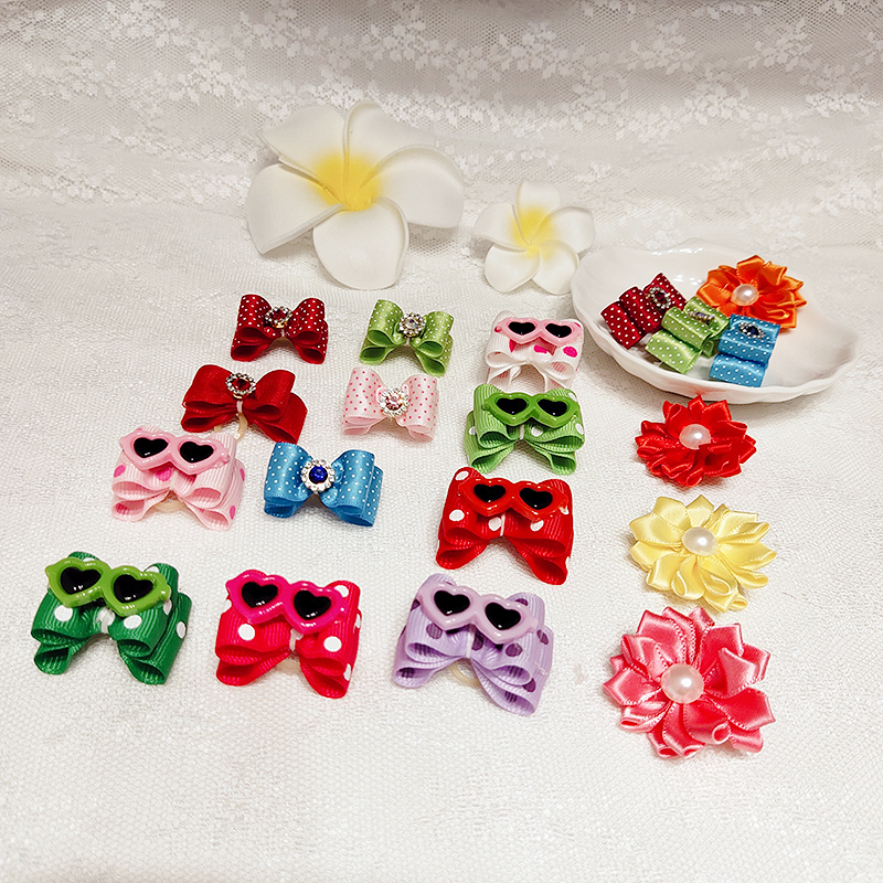 a pair of pet skin muscle dog hair band hair band Teddy cute bow polka dot glasses no fur muscle damage