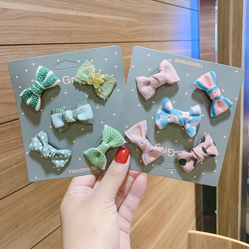 New ppet butterfly knot hair clip dogs not easy to U-turn on Teddy Yorkshire ornament Malzise head flower