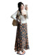 French retro floral suspender dress for women summer 2026 new seaside vacation temperament long skirt suit