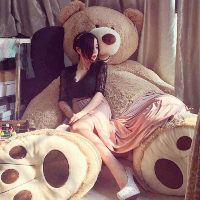 hugging big teddy bear