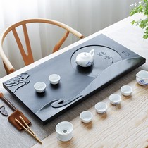 New product whole piece Wujin Stone tea tray household natural stone tray black gold stone tea table drainage kung fu tea set Tea Sea