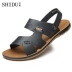 Hiển thị giày nam đi biển gân bò đi dép xăng đan hai người dùng bên ngoài giày dép nam 713225N02 sandal da nam Sandal