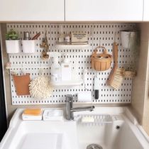The non-perforated toilet hole board above the shelf on the balcony laundry pool