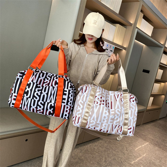 Japanese-style large-capacity portable fitness travel bag fashionable lightweight short-distance luggage bag business trip storage boarding
