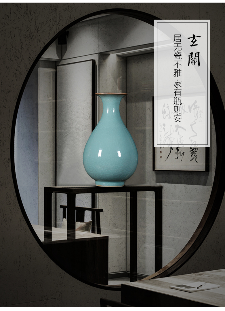 Jingdezhen ceramics celadon vase archaize up with classic Chinese style flower arrangement sitting room adornment is placed TV ark