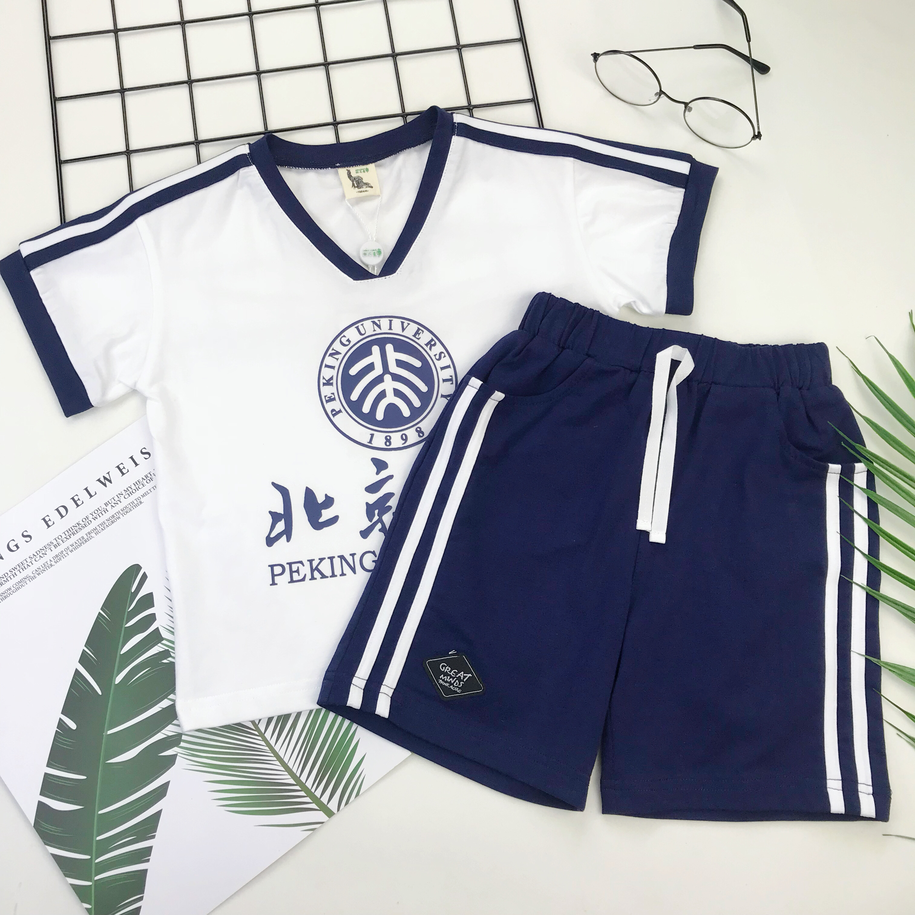 Mùa hè mới quần áo trẻ em Áo phông Đại học Bắc Kinh in đại học gió tay ngắn Áo thun cotton thoáng khí tay áo ngắn - Áo thun áo thun trẻ em dài tay