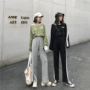 Quần áo nữ mùa thu 2018 mới street style cô gái màu sắc kết hợp áo dài tay in chữ rộng T + giản dị chân rộng phù hợp với quần áo kiểu nữ đẹp tuổi 35