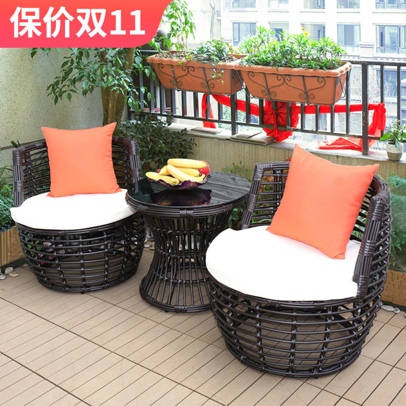 Rattan leisure chair balcony table and chair three-piece combination simple chair coffee table small round table hotel woven rattan chair
