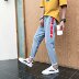 Xuân 2018 Hồng Kông thêu chín điểm quần jeans Phiên bản Hàn Quốc của xu hướng quần lửng hậu cung mới hoang dã shop đồ nam Cao bồi