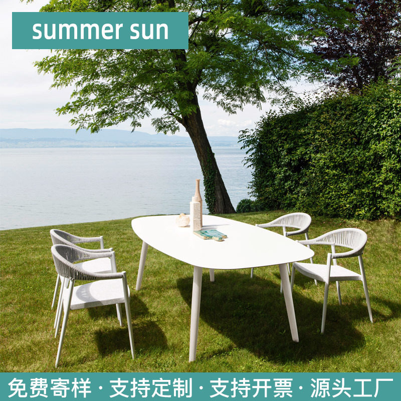 Outdoor table and chair courtyard sub leisure open-air exposed garden outdoor North Ouyang Tai rattan chair three-piece combination simple