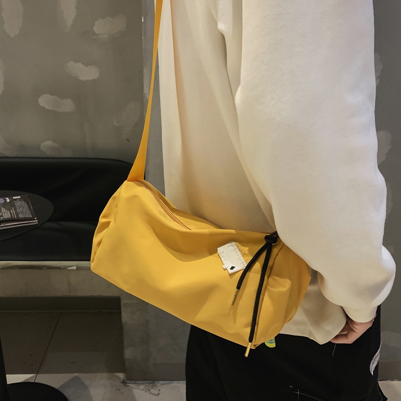 Tide brand shoulder bag men's casual all-match small backpack student Japanese light postman bag literary couple Messenger bag