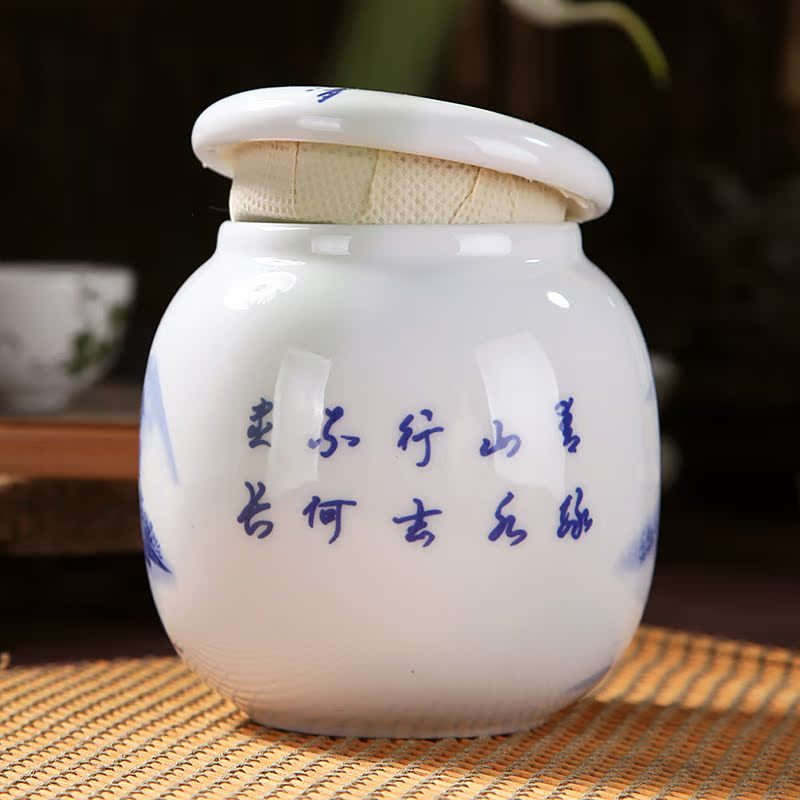 The Crown, jingdezhen ceramic blue and white porcelain tea pot small POTS sealed tank storage as cans of 140 grams of tieguanyin