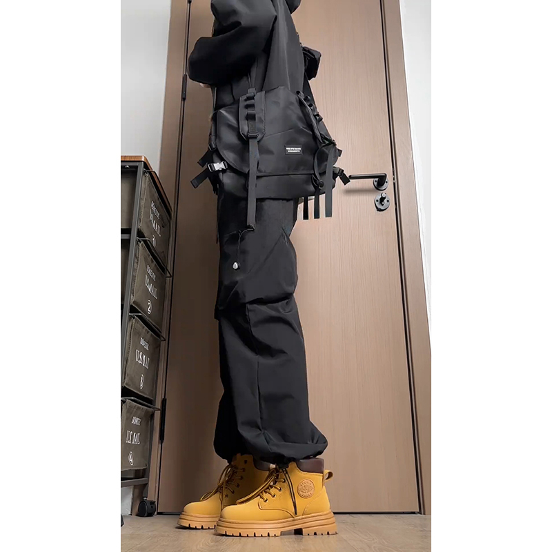 Black Cargo Pants for Men Paired with Yellow Martin Boots, American High Street Style, Functional Military-Style, Water-Resistant, Windproof, and Dustproof Tactical Pants
