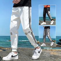 Spring and autumn pants Mens fashion brand Korean version of the autumn wild fashion brand slim ice silk small feet loose sports casual pants