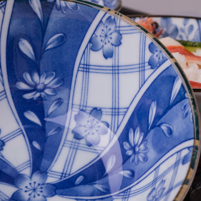 Japanese use of domestic and imported glaze color move ceramic tableware under large blue and white bowl of soup bowl rice bowls