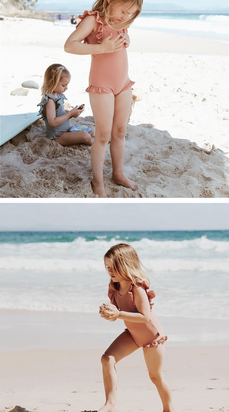 Đồ bơi cho trẻ em gái Công chúa tay áo trẻ em Màu đơn sắc Áo tắm một mảnh Beach Holiday Kem chống nắng Đồ bơi nhanh khô - Bộ đồ bơi của Kid đồ bơi cho trẻ