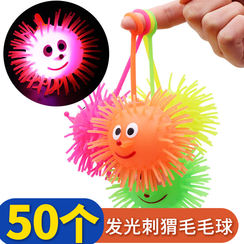 A boxed 24 luminous inflatable soft silicone wool swow caterpillar glowing hedgehog elastic flash to vent the ball